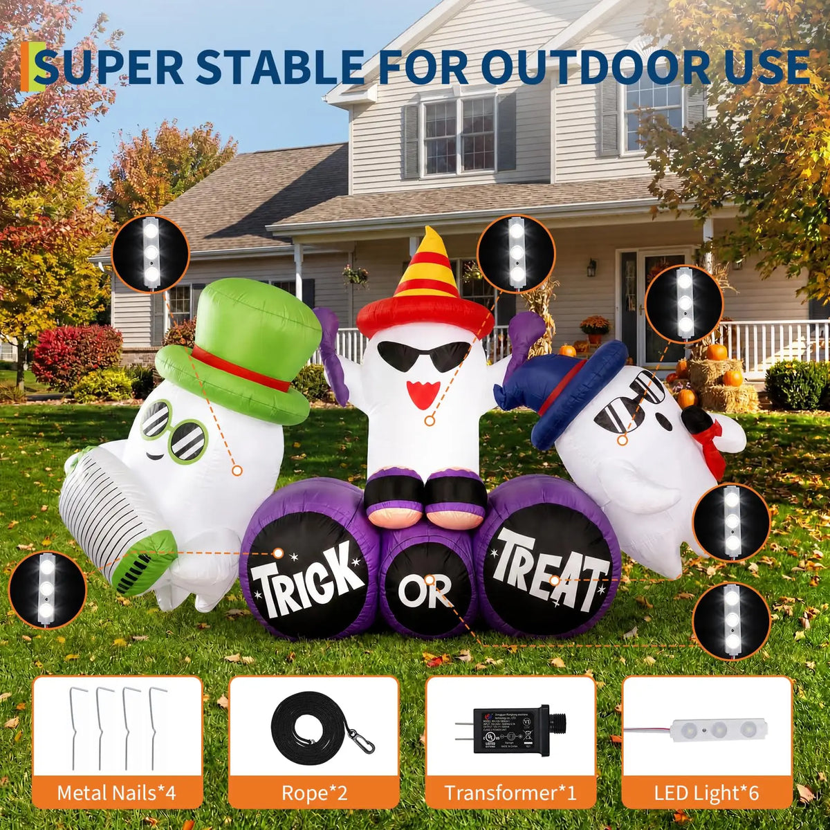 Ghost band inflatable on a front lawn with its 6 LED light positions marked, plus the included 4 metal stakes, 2 ropes, power adapter and 6 LED lights
